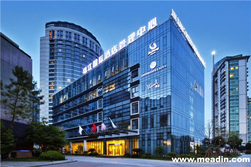 上海锦江国际酒店发展股份有限公司2017年半报告摘要